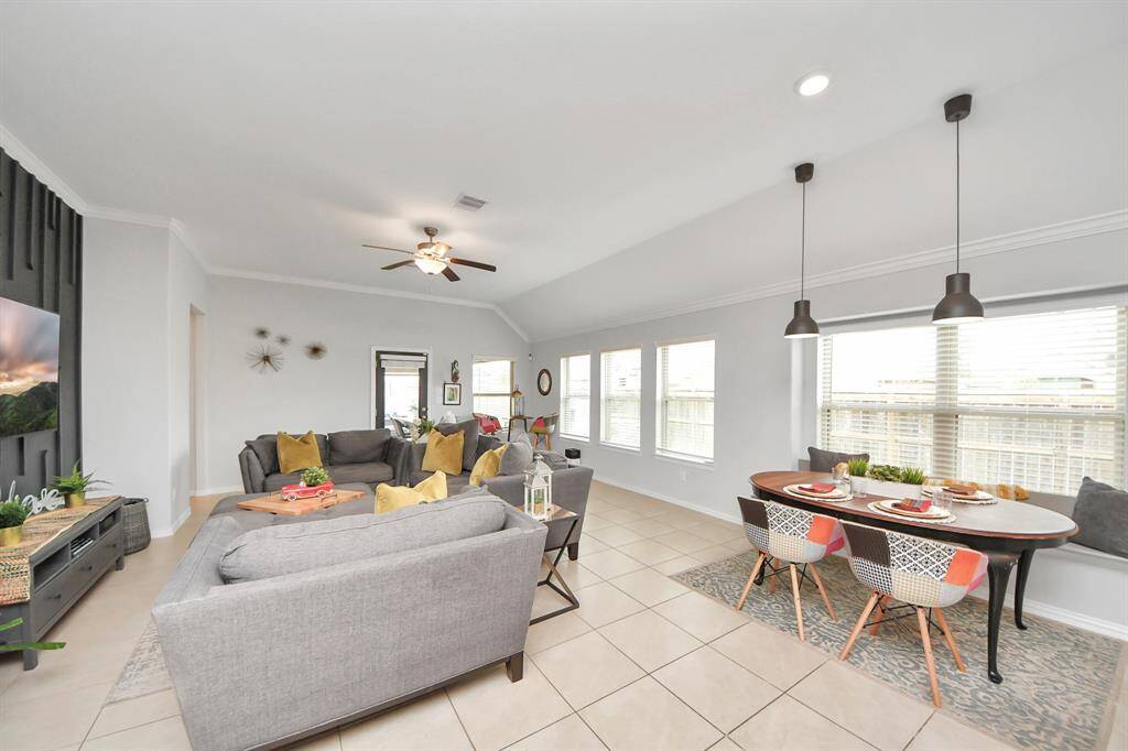 Open layout seamlessly connects the kitchen, breakfast area & massive living room.