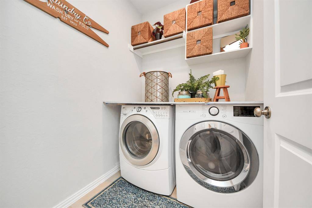 Huge utility room with built-ins, too.