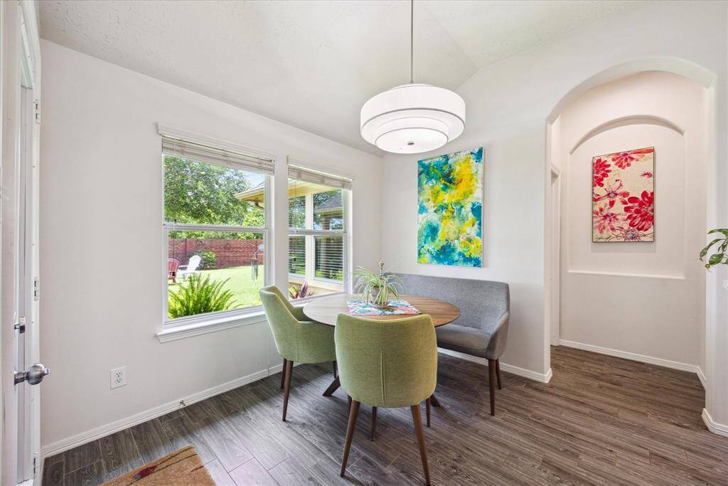 Enjoy garden views and natural light from the cozy breakfast nook just off the kitchen.