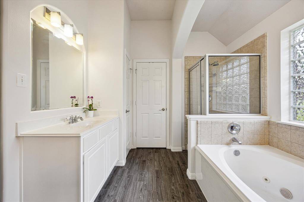 Clean lines and a spacious layout make this bathroom a true retreat with both function and style.