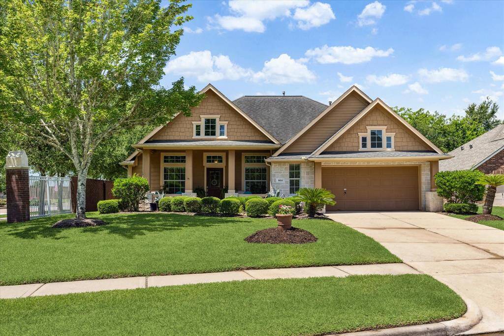 The professionally landscaped yard and welcoming curb appeal set the tone for this beautifully updated home.