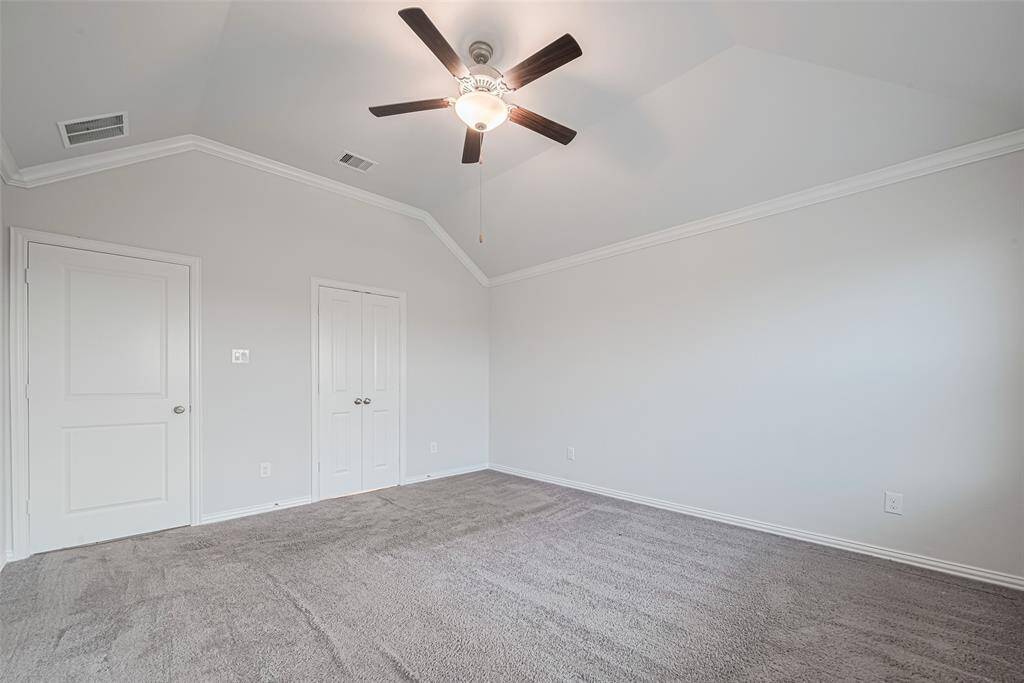 Spacious primary suite with walk in closet