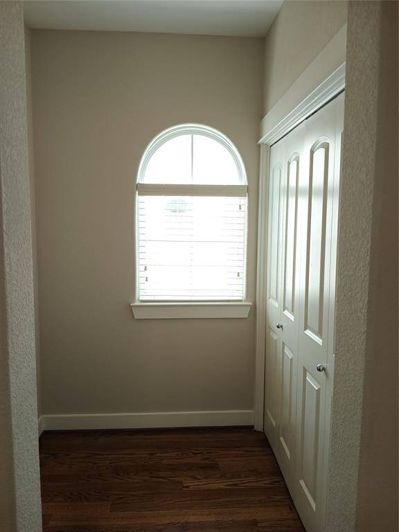 Laundry area is off this vestibule.  Washer and dryer are included.  Plenty of room to put a bookcase or cabinet on the opposite wall.