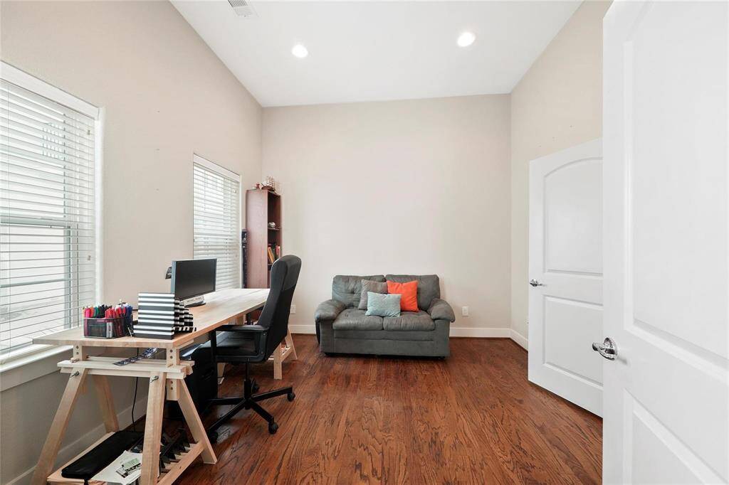 First floor bedroom with hardwood floors and private bath.  This could be a great office!