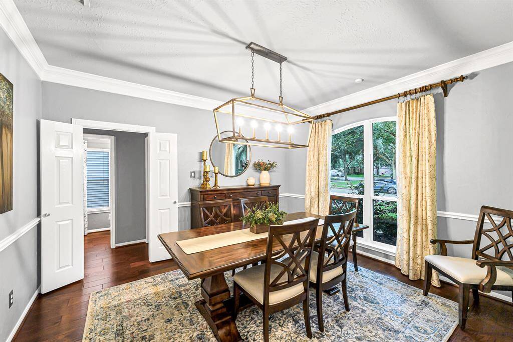 VIEW OF FORMAL DINING ROOM FROM ENTRYWAY