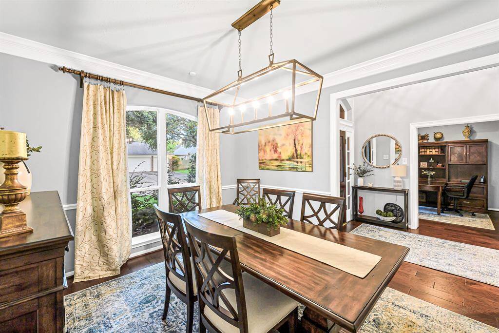 FORMAL DINING ROOM WITH UPGRADED LIGHTING