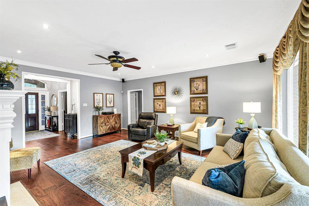 VIEW OF FAMILY ROOM FROM KITCHEN DINING AREA