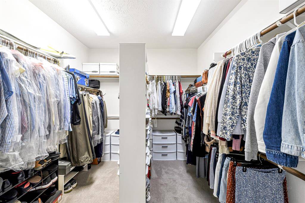 HIS AND HERS WALK-IN CLOSET