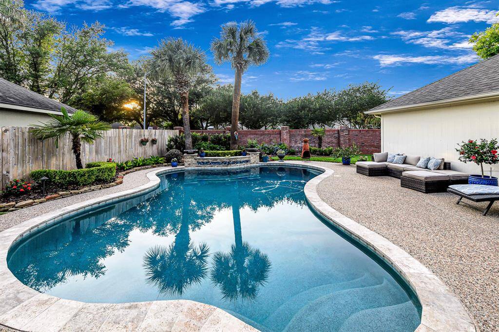 RESORT-STYLE POOL GREETS YOU AND YOUR GUESTS FOR THOSE LAZY SUMMER DAYS
