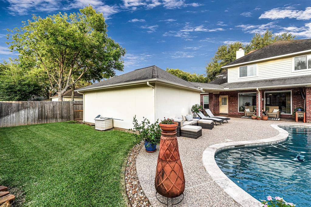 PLENTY OF BACKYARD PLAY AREA FOR CHILDREN AND PETS