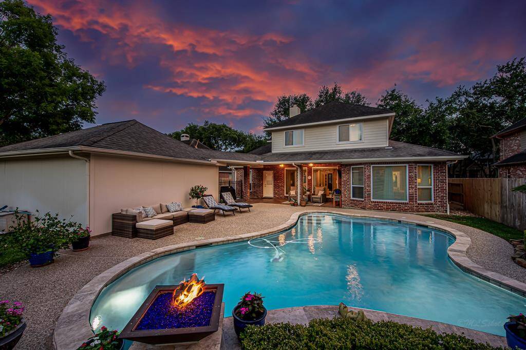 DRAMATIC FIRE FEATURES ARE ONE OF THE MANY HIGHLIGHTS OF THIS FABULOUS NEW TERRITORY HOME!