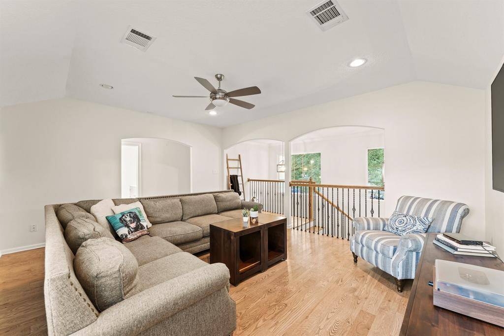 Great additional living space on second floor accommodates large sectional and accent chair.  Tons of storage in this home w walk-in closet in this room too.