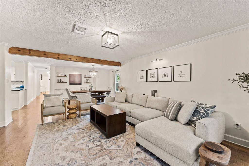 Open concept living with living-dining-kitchen all accessible from main first floor hall.