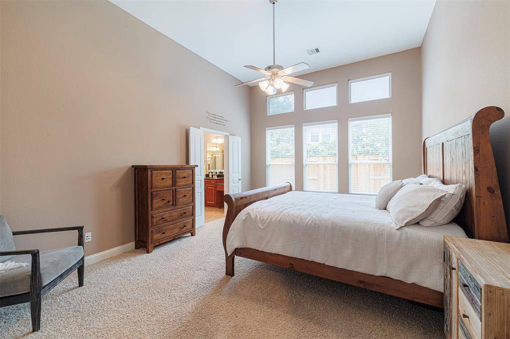 Lovely primary suite with high ceilings and ensuite bath.