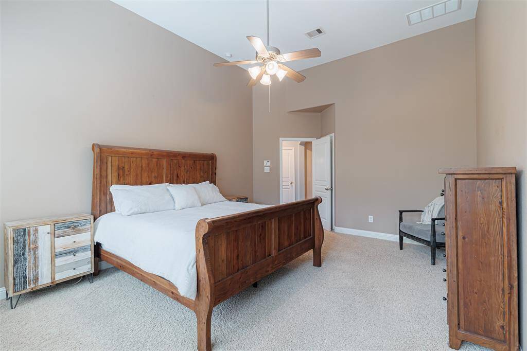 Another view of the primary bedroom.