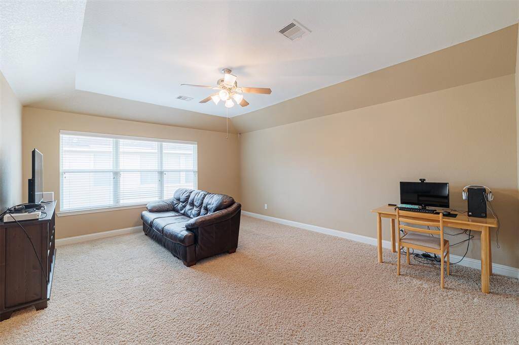 Large game room located upstairs.