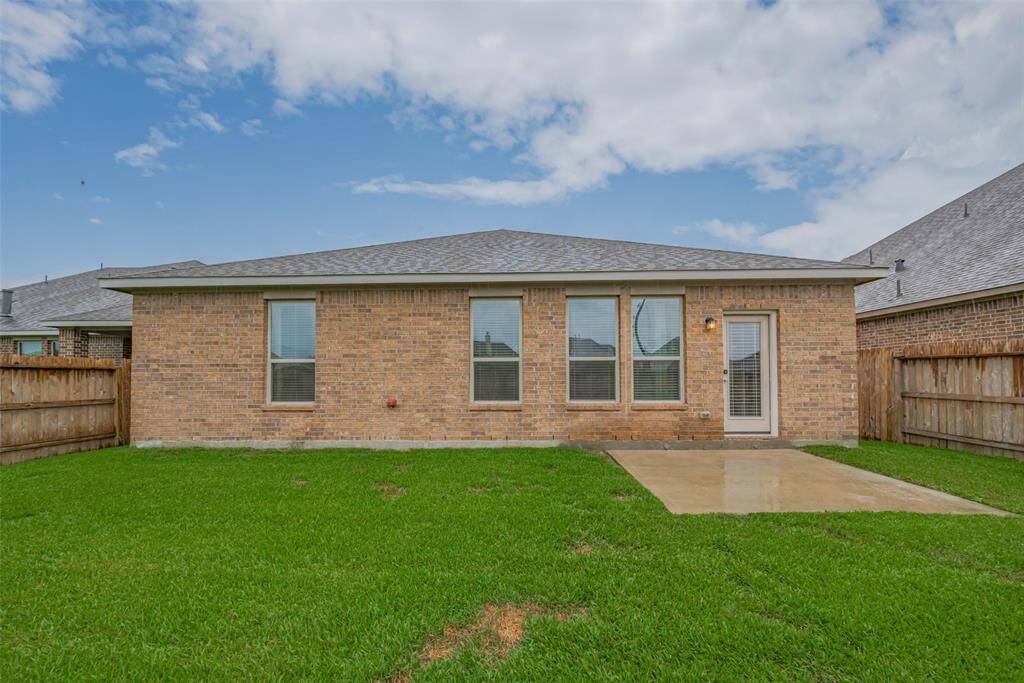 The expansive backyard measures 48'8" x 71'10", offering ample space for outdoor activities, gardening, or future enhancements. A 9'4" x 9'5" concrete patio provides the perfect spot for outdoor dining, lounging, or entertaining guests.