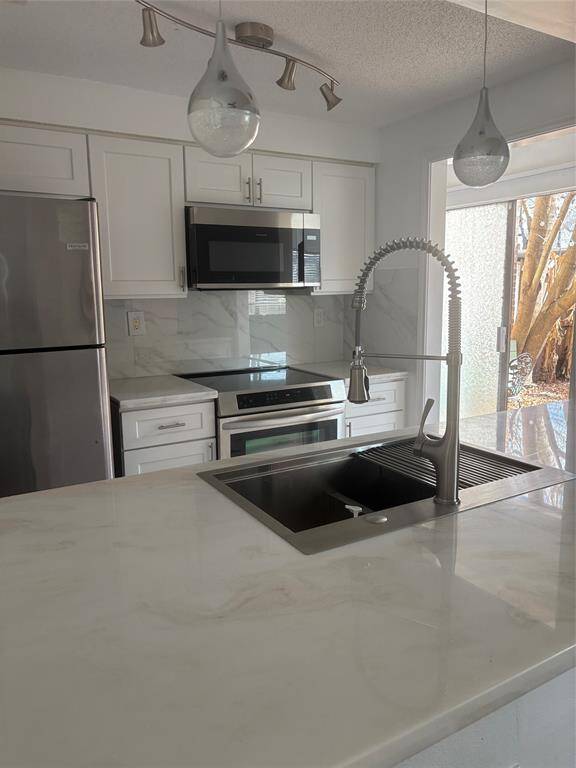 Kitchen overlooking the patio