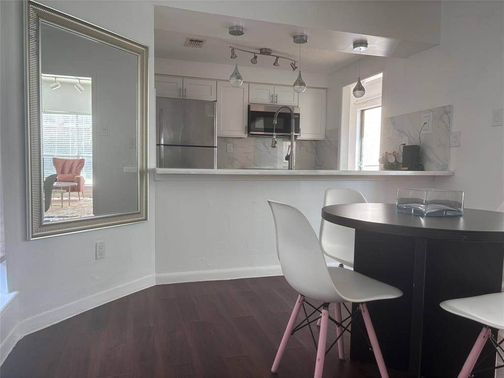 Dining overlooking breakfast bar