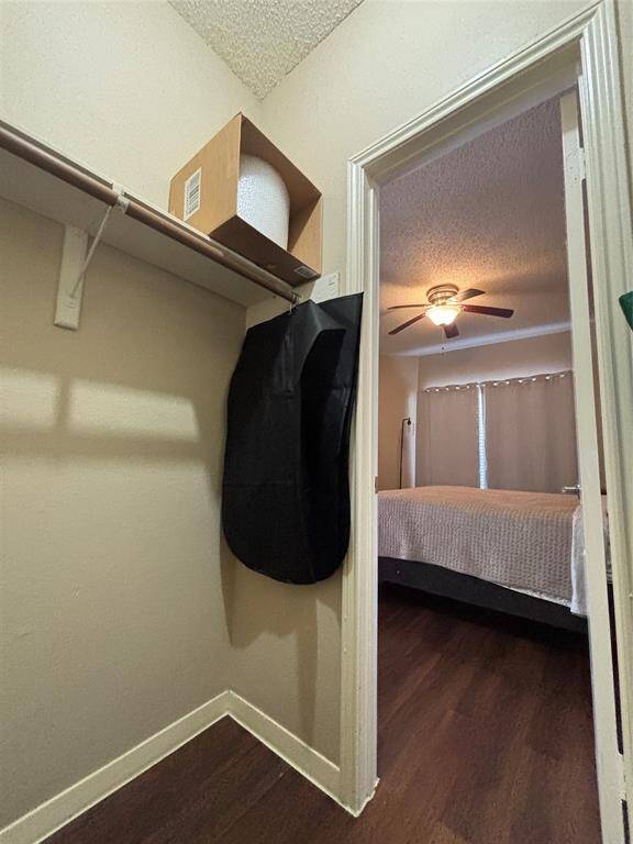 Walk in closet inside the bedroom
