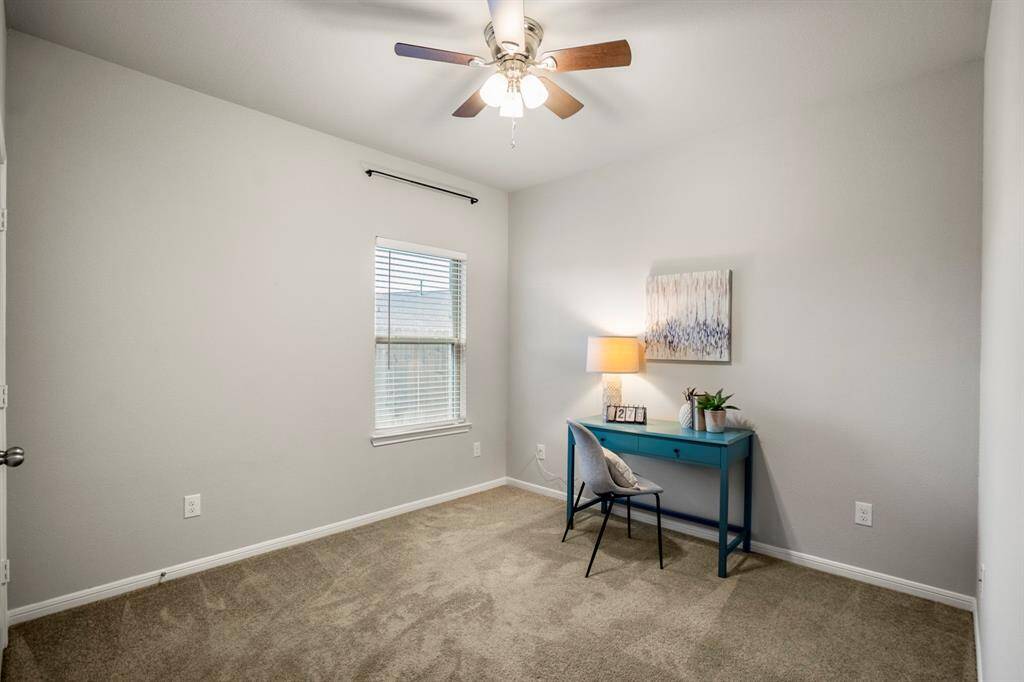 Whether used as a bedroom, home office, or creative space, this room offers flexibility to fit your needs. Natural light fills the space through the window, and the upgraded ceiling fan keeps things cool and comfortable. Neutral tones and soft carpet create a blank canvas ready for your personal touch.