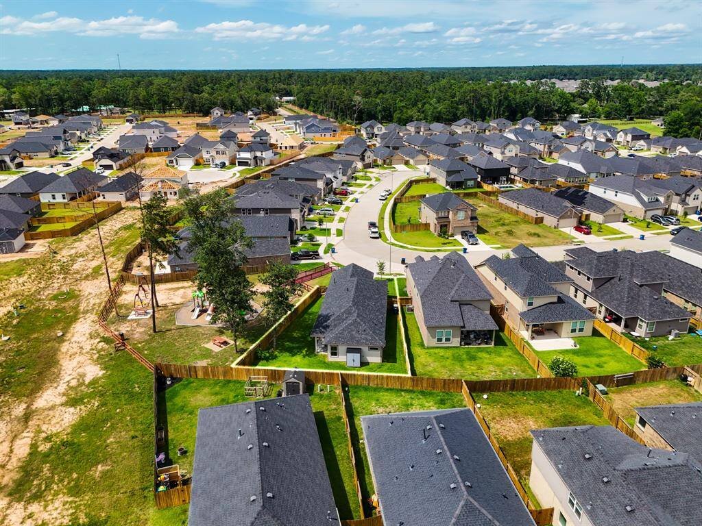 Tucked into a curve at the end of a quiet loop, this home offers the space and openness of a corner lot—without the typical street-on-two-sides setup. With no side neighbors on one side and the park right next door, the lot feels extra private and far more spacious than the average.