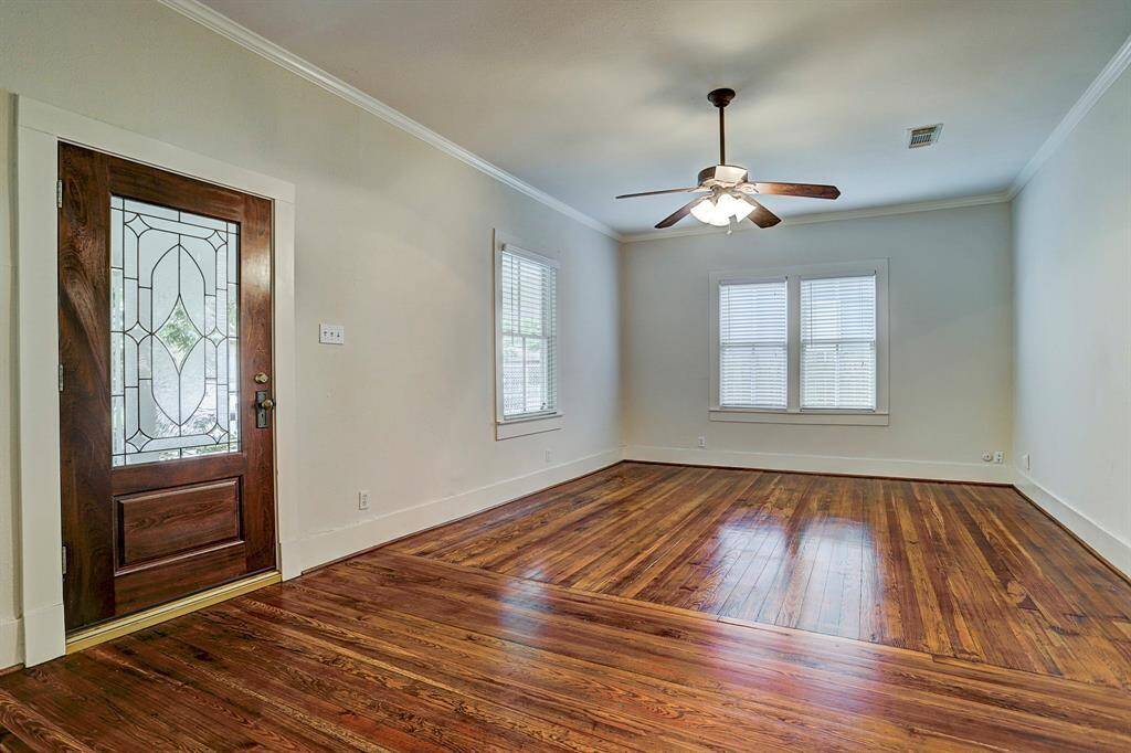 [Living Room] Oak hardwood floors welcome you into this light and bright living space.
