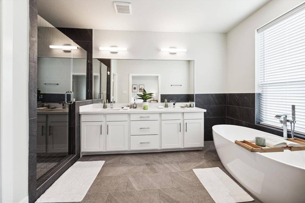 **Not of actual home, photos of another recently completed home within same community with similar plan & finishes**