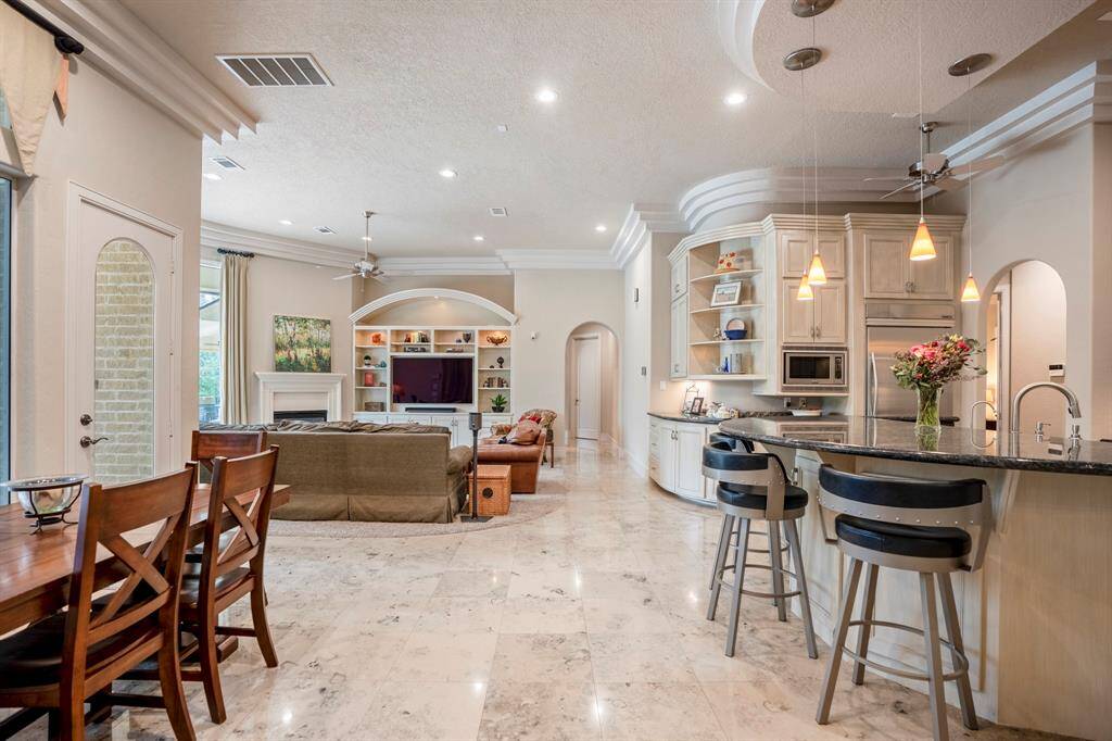 Natural light fills the home. The orientation of the home is ideal for Texas weather with shade for relaxing afternoons and evenings.