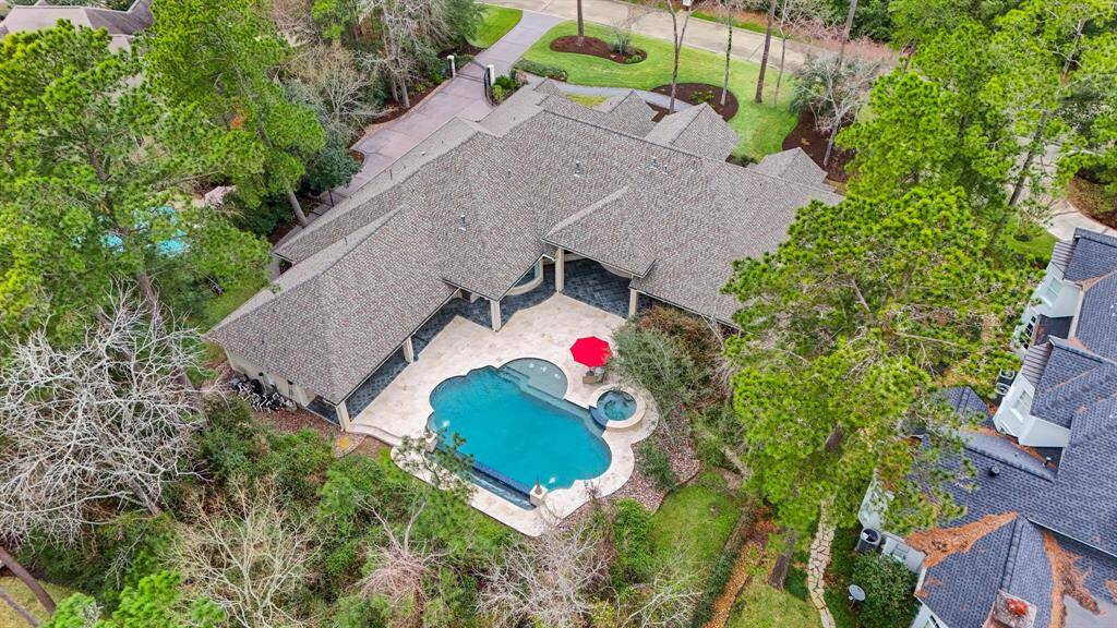 The seamless flow between the interior and exterior of this property is a masterful design element, providing both views and easy access to the pool area and the stunning covered lanai. Designed to maximize enjoyment of our Texas weather; the generous covered areas offer over 1,000 square feet of exterior living space, perfect for relaxing or entertaining.
