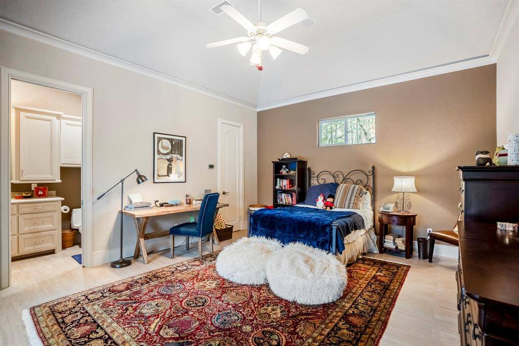 The fourth bedroom is a spacious suite unto itself, complete with its own entrance like a 'casita.' For added versatility, it can be attached to the rest of the home, as it is under the same roofline and HVAC system.