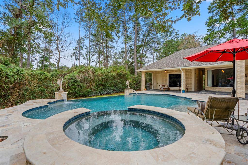The hot tub/spa is just steps away from the master suite and provides an endless view of nature.