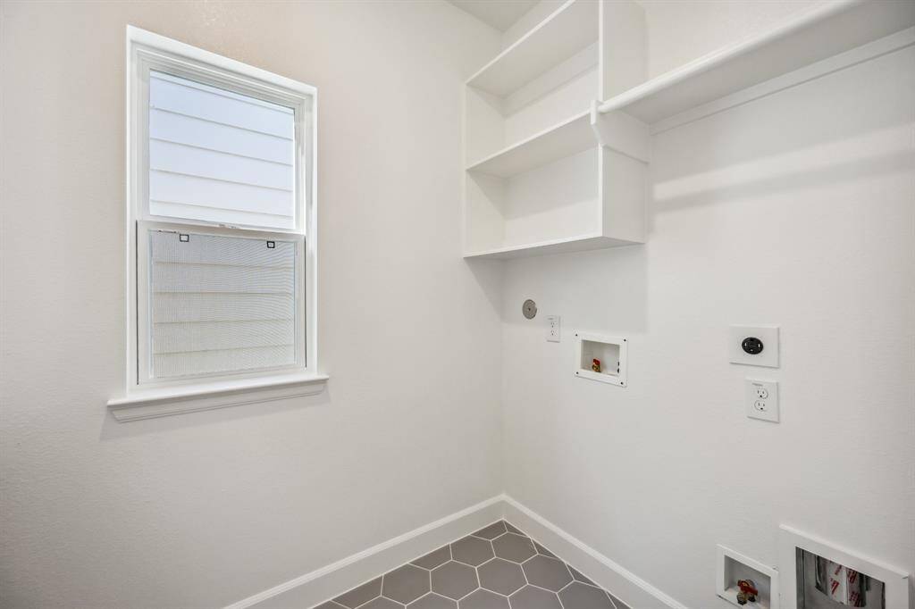 Effortless Functionality: Situated upstairs for utmost convenience, the utility room streamlines household tasks, blending seamlessly into the flow of your domestic life.