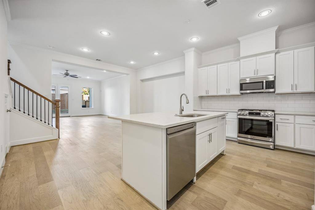 Entertainer's Delight: Seamless flow from kitchen to dining to living space ensures every gathering is unforgettable. Style meets practicality with expansive storage solutions and sophisticated design.
