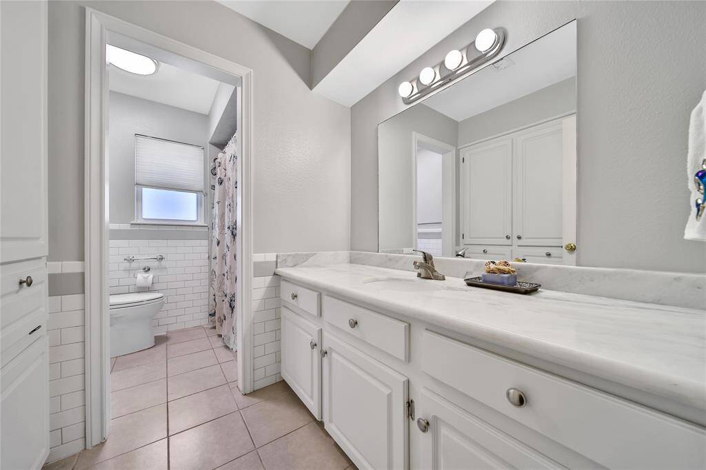 View of secondary bathroom.