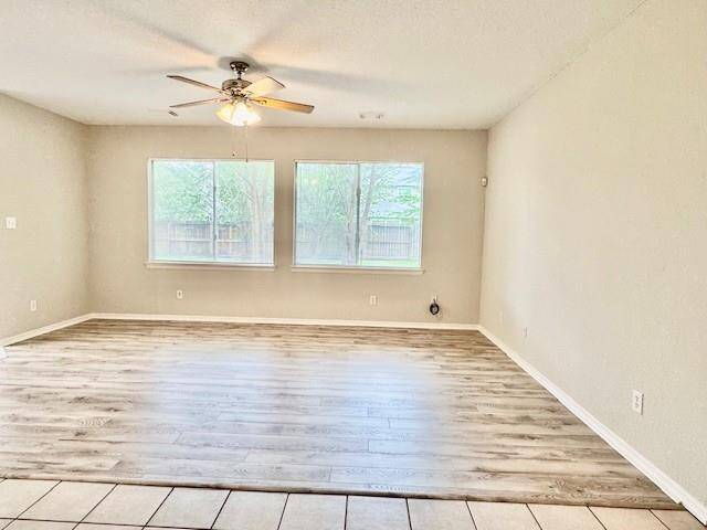 Family room with laminated wood floor
