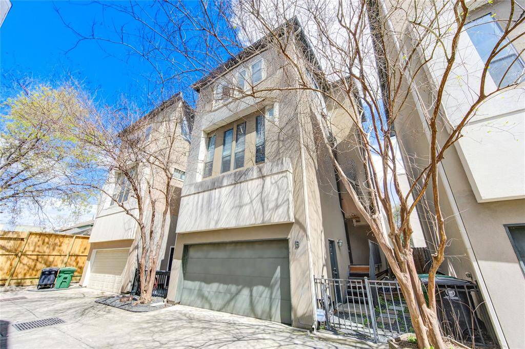 Nestled in a gated community in the heart of the Heights, this beautifully designed home showcases a charming blend of modern and traditional architecture with a neutral color palette.