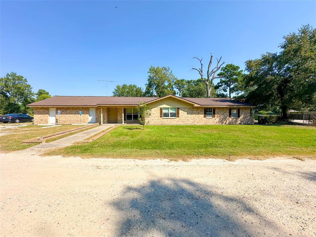 1 story home which now has separate doors for each bedroom/office space