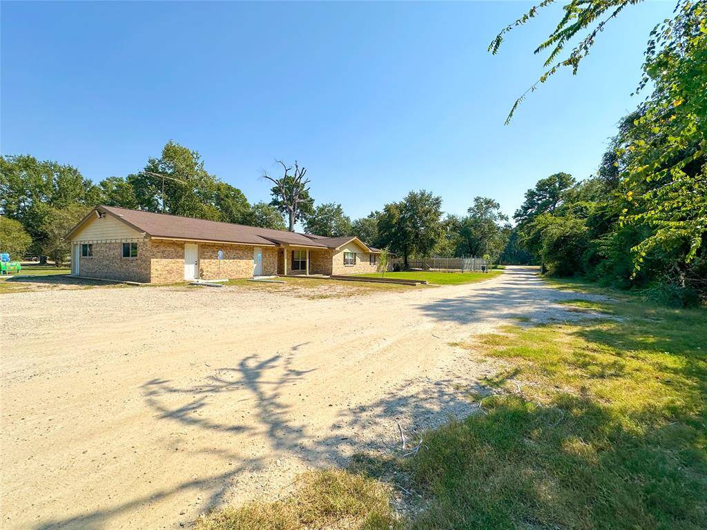 1 story home, 2 Metal Buildings on over 3 Acres!