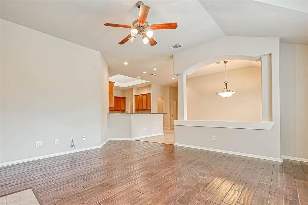 Looking from Family Room toward Breakfast Room and Kitchen