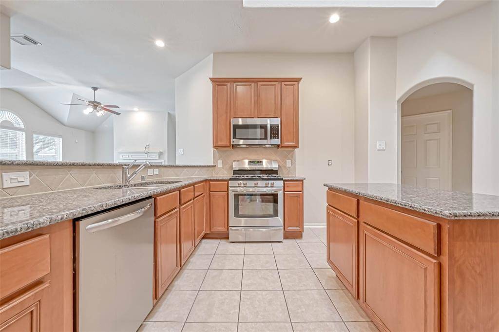 Check pu tall of the work space in this kitchen.