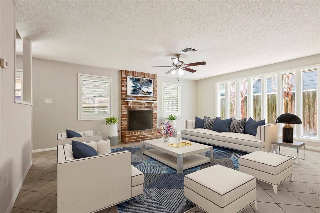 Living room with fire place. Staged photo