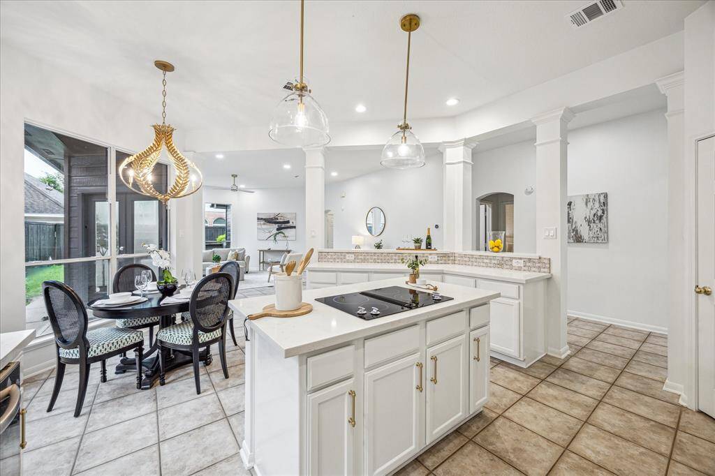 Notice the designer light fixtures!
