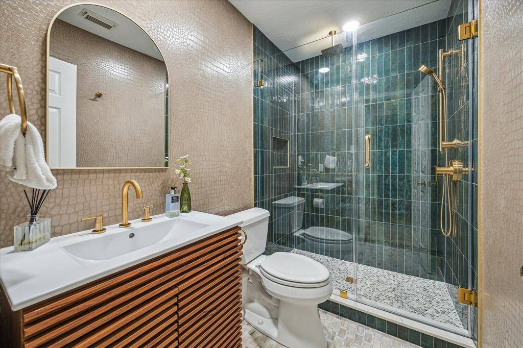 Wow!  The secondary bathroom was fully remodeled in 2024 and is sure to impress.