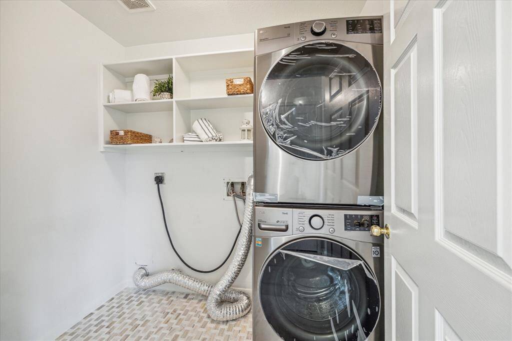 New flooring tile and practically brand new washer/dryer