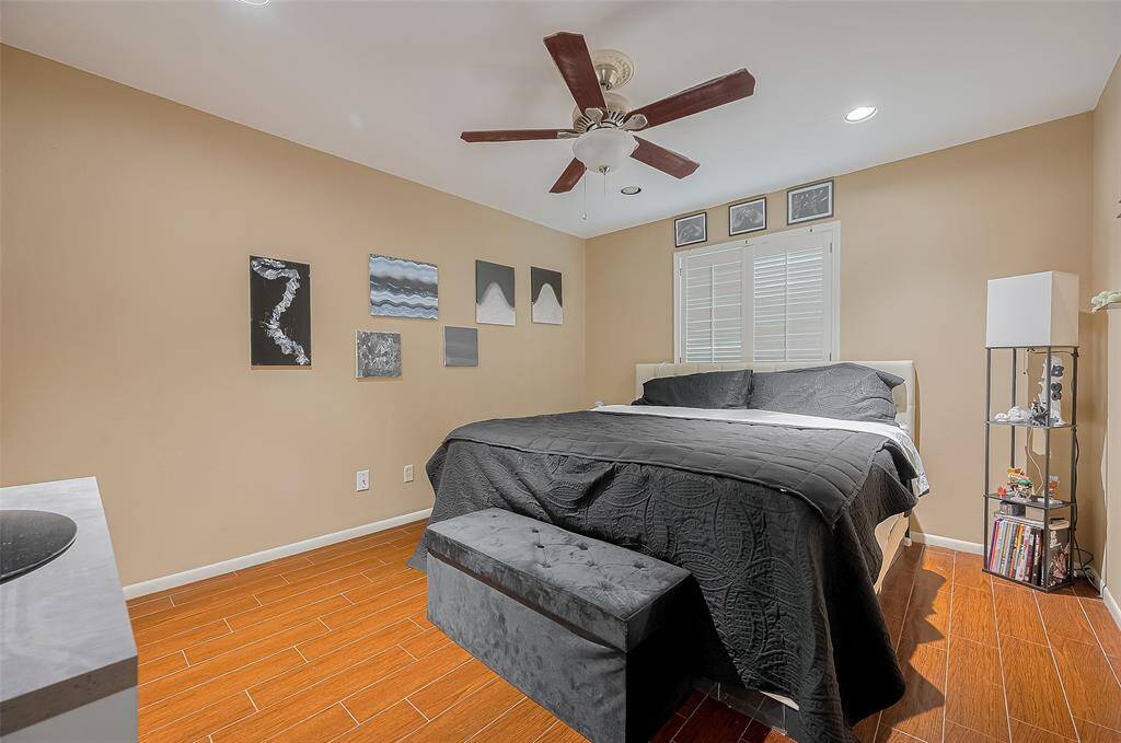 secondary bedroom with walk in closet