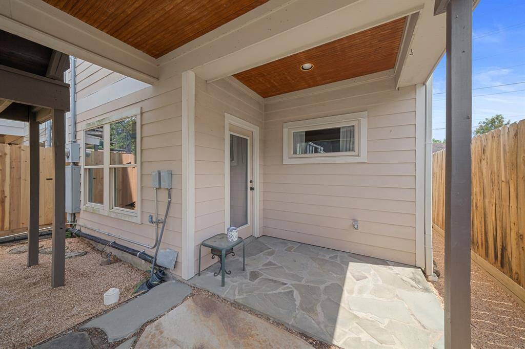 Get out from under the Texas sun, but still enjoy the great outdoors under this amazing covered patio!