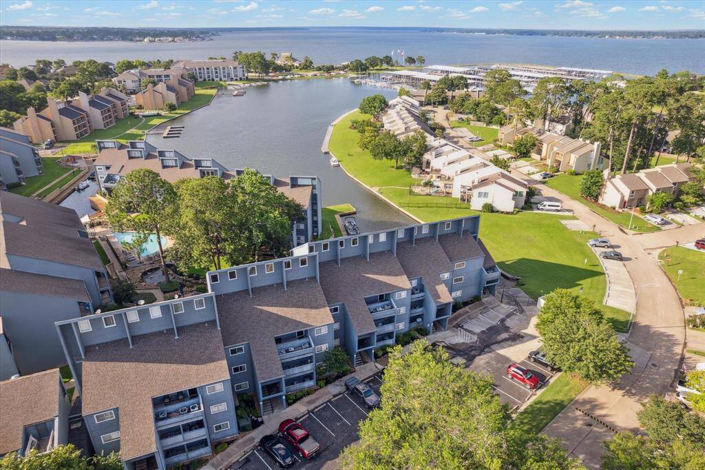 Ariel view of the community, pool and access to Lake Conroe.