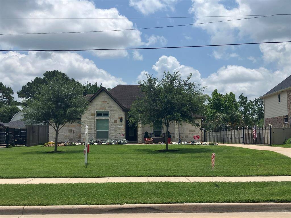 Giant Front yard with 1/2 acre in the rear!