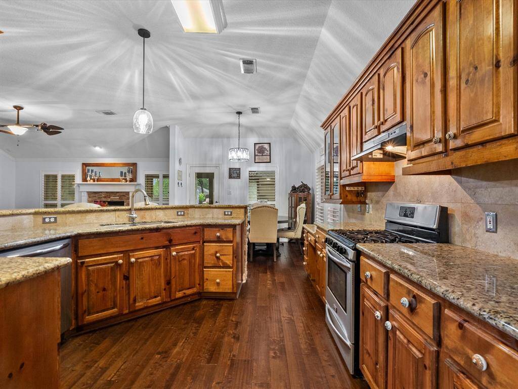 Large kitchen with view to den